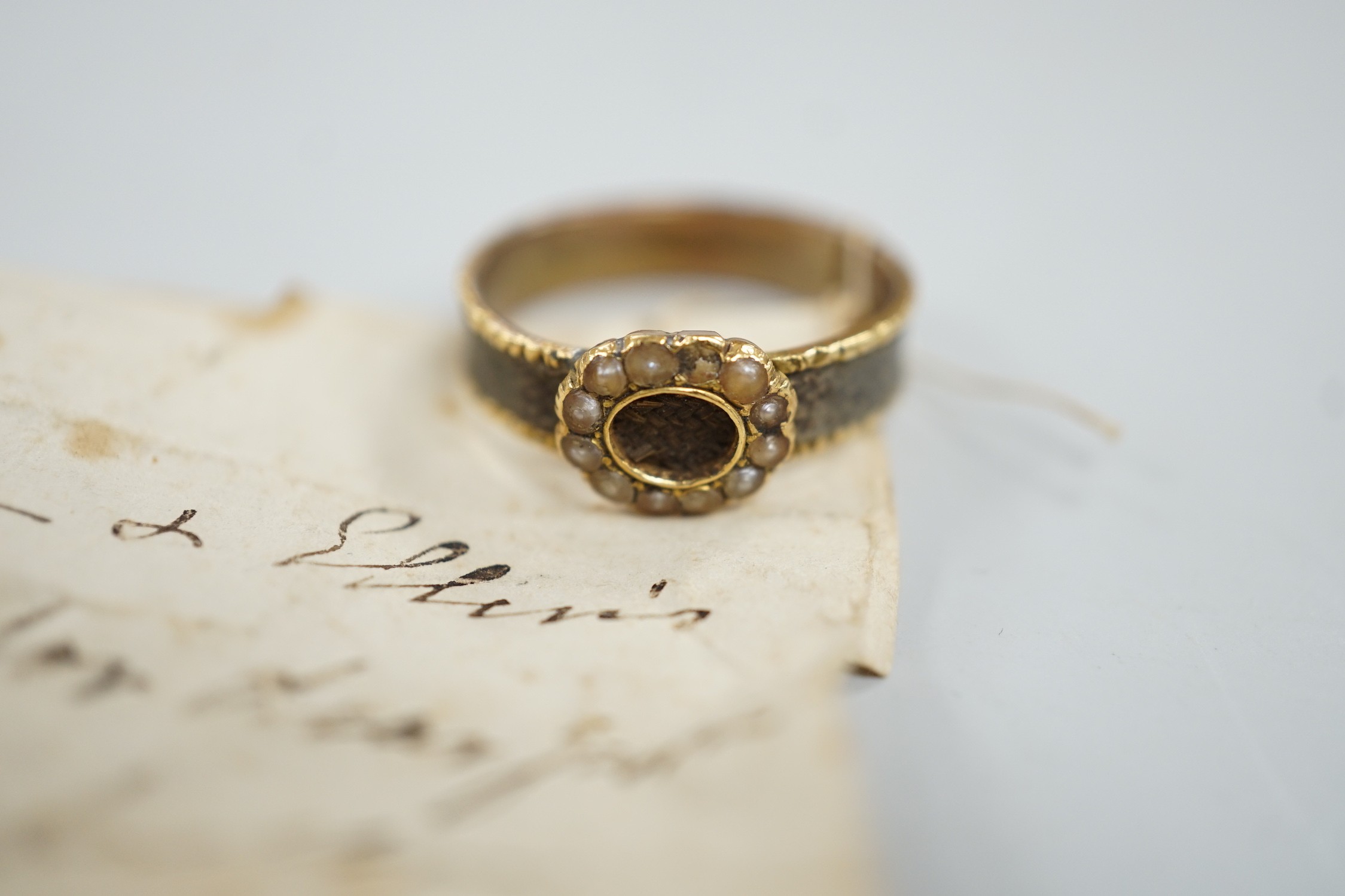 A 19th century yellow metal, split pearl and plaited hair set mourning ring, size O, gross weight - Image 2 of 6