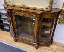 A Victorian gilt metal mounted burr walnut serpentine credenza, width 148cm, depth 44cm, height