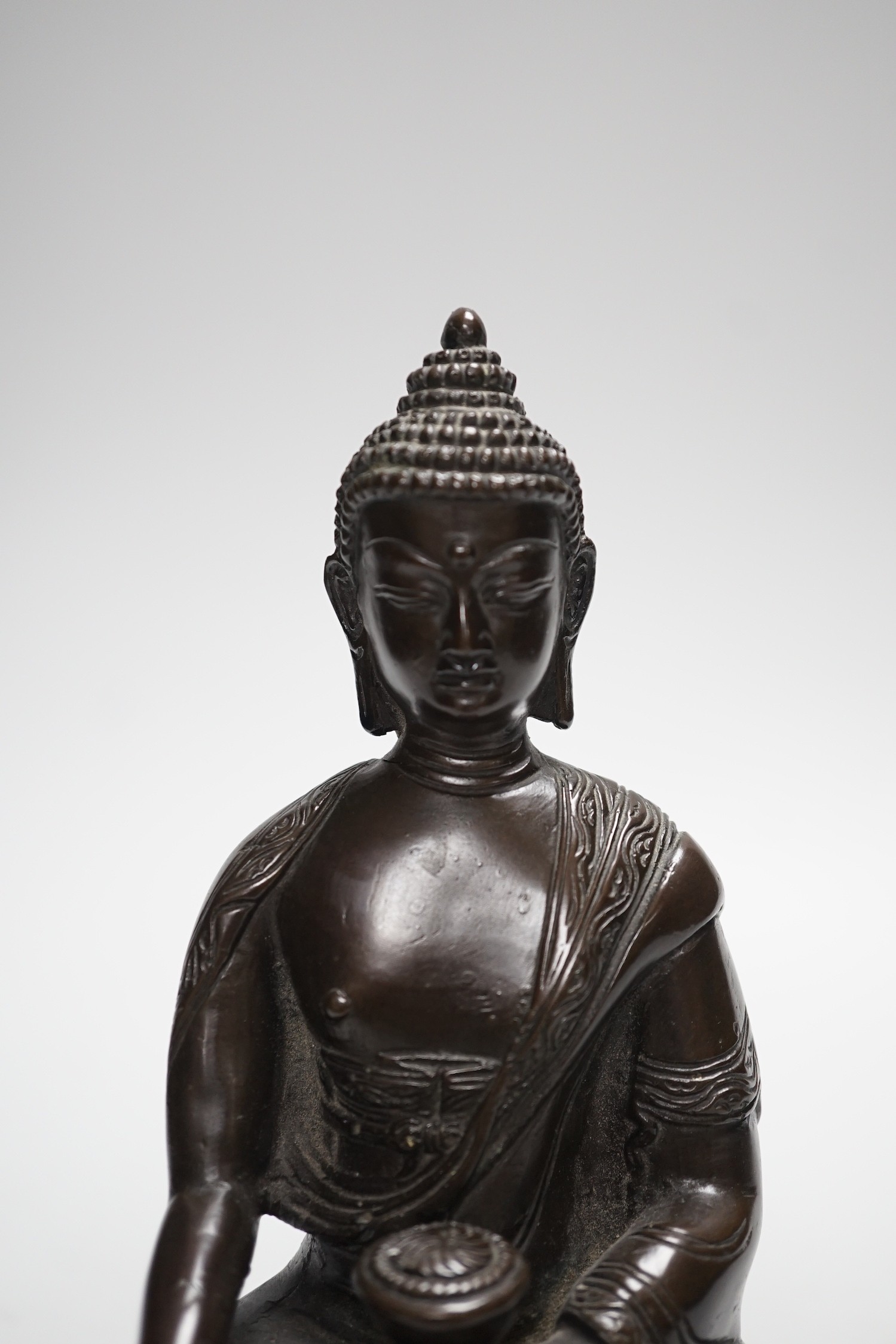 A Chinese bronze Buddha, on lotus base, 20cms high - Image 2 of 5