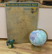 A BP oil can, Michelin motoring map and a revolving globe.