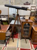 An early 20th century, Broadhurst and Clarkson astronomical telescope on folding tripod, the