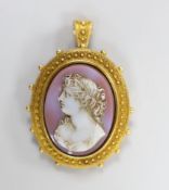 A Victorian yellow metal and hardstone cameo set oval pendant brooch (pin missing) with cannetile