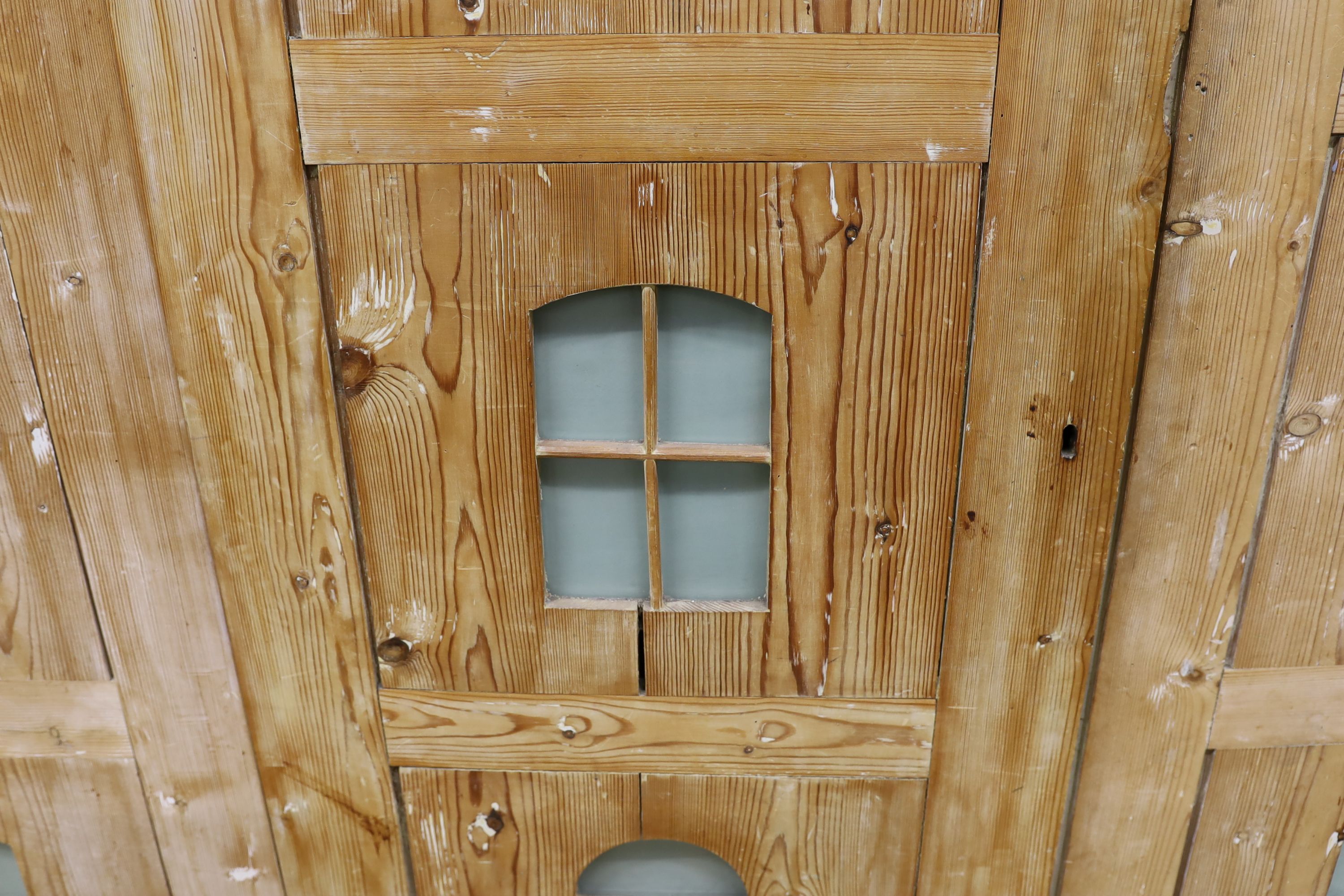 A 19th century stripped pine hall cupboard modelled as a dolls house the two door nine window facade - Image 6 of 20