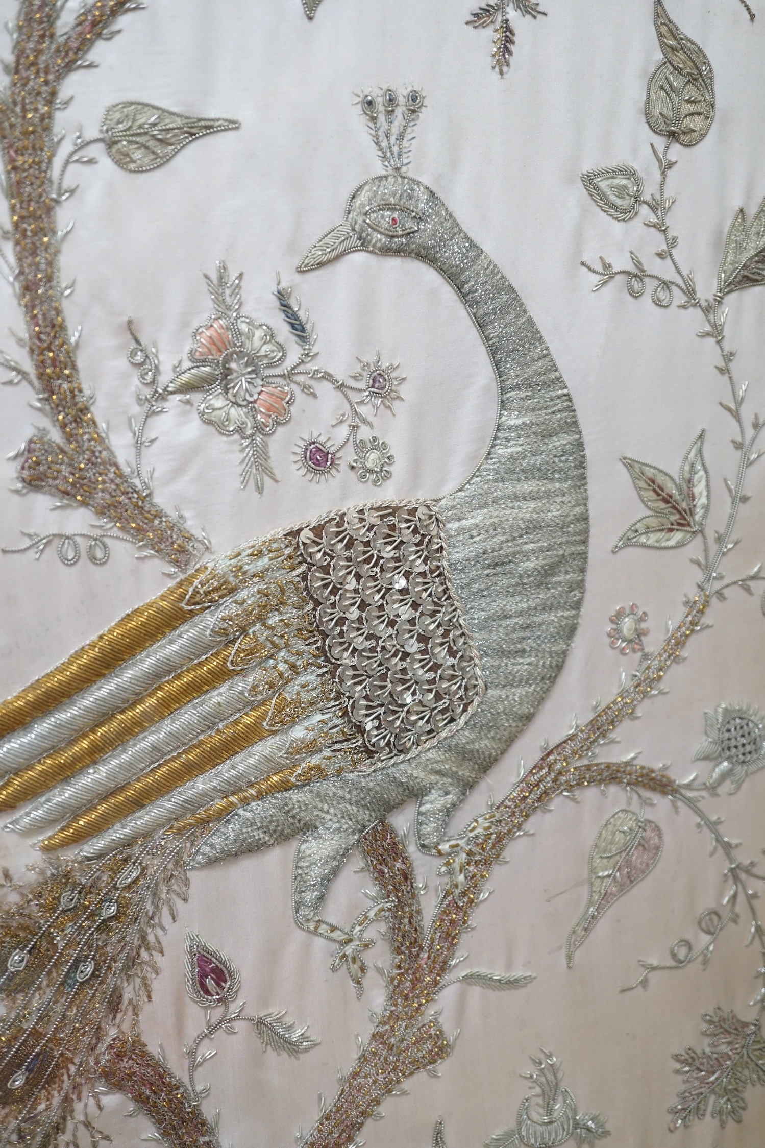 A framed silk, multi coloured metal thread embroidered Indian panel: a peacock seated amongst birds, - Image 5 of 8