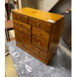 A walnut eight drawer miniature chest, width 51cm, depth 24cm, height 49cm