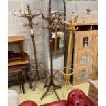 Three bentwood coat stands, largest height 192cm