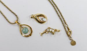 Three modern 18k and gem set small pendants, including cultured pearl set dolphin, overall 28mm