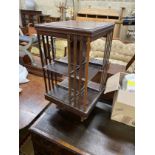 An Edwardian inlaid mahogany revolving bookcase, width 46cm, height 83cm