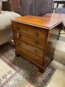 A small George III style satinwood inlaid mahogany four drawer chest with slide, width 67cm, depth