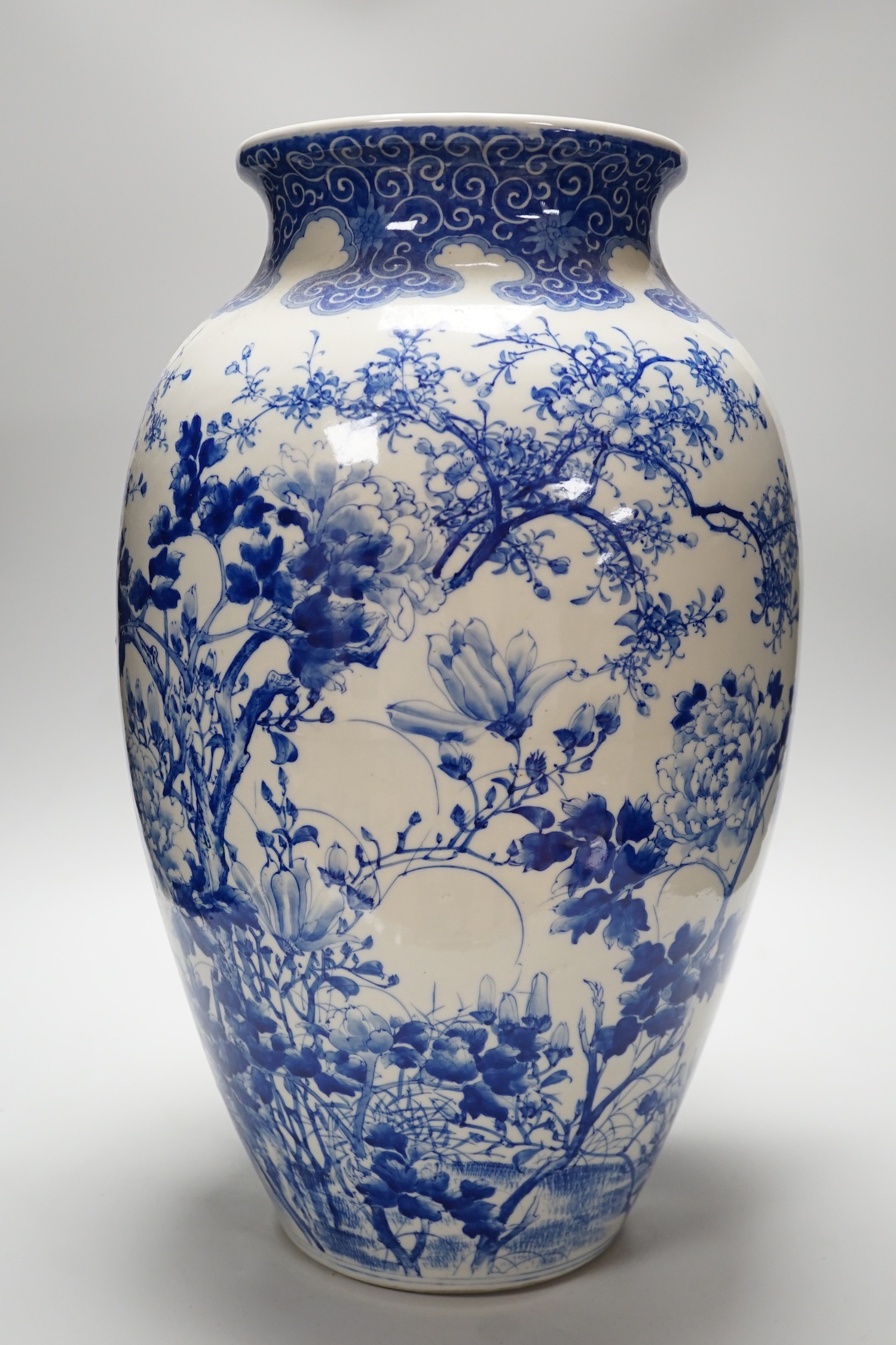 A large Japanese blue and white vase decorated with foliage and birds, 49cms high - Image 3 of 5