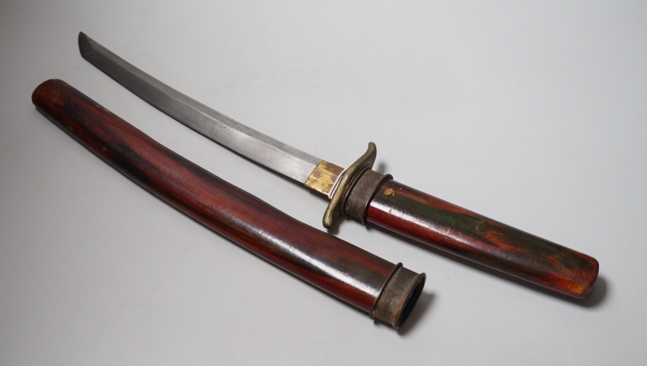 A 19th century Chinese duan dao, 56cm total length including saya