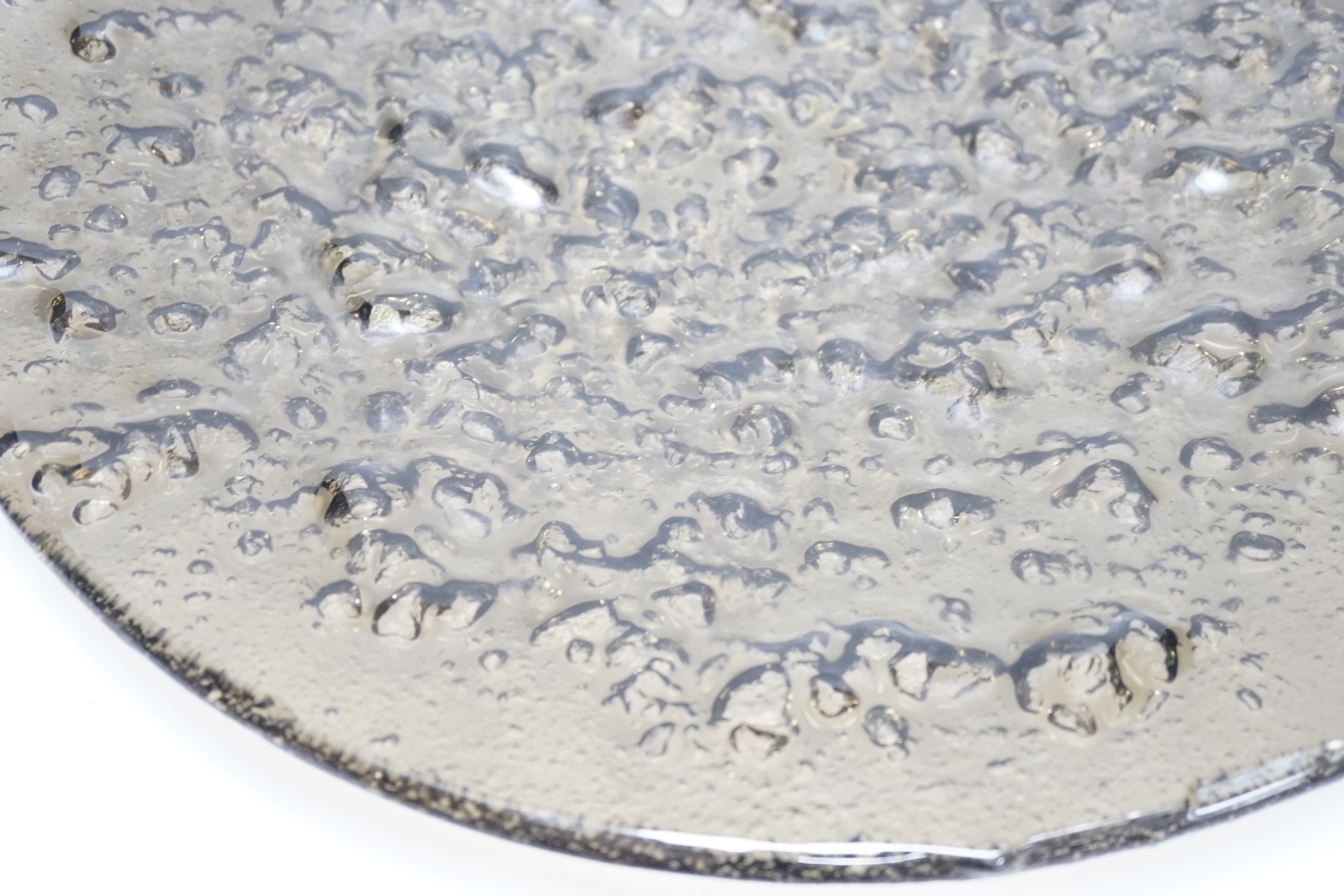 A large rubber-based pewter-coloured glass dish, 48cm - Image 5 of 5