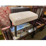 A George III style rectangular upholstered ebonised dressing stool, length 71cm, depth 40cm,