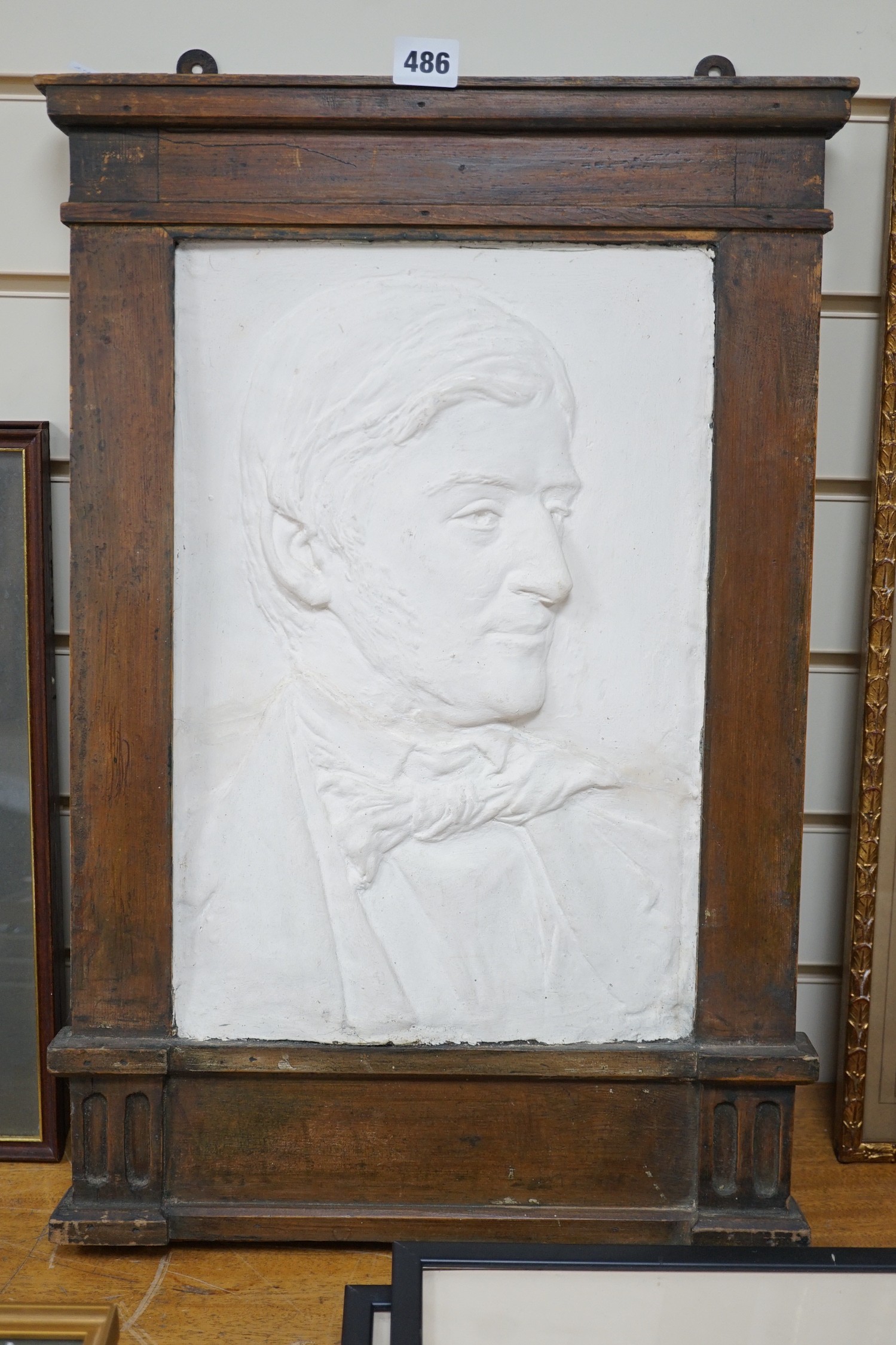 A relief moulded portrait bust, Ralph Waldo Emerson, in architectural frame, 37cms wide x 58.5cms - Image 2 of 2