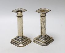 A pair of George V silver mounted dwarf candlesticks, James Dixon & Sons, Sheffield, 1913, 13.8cm,