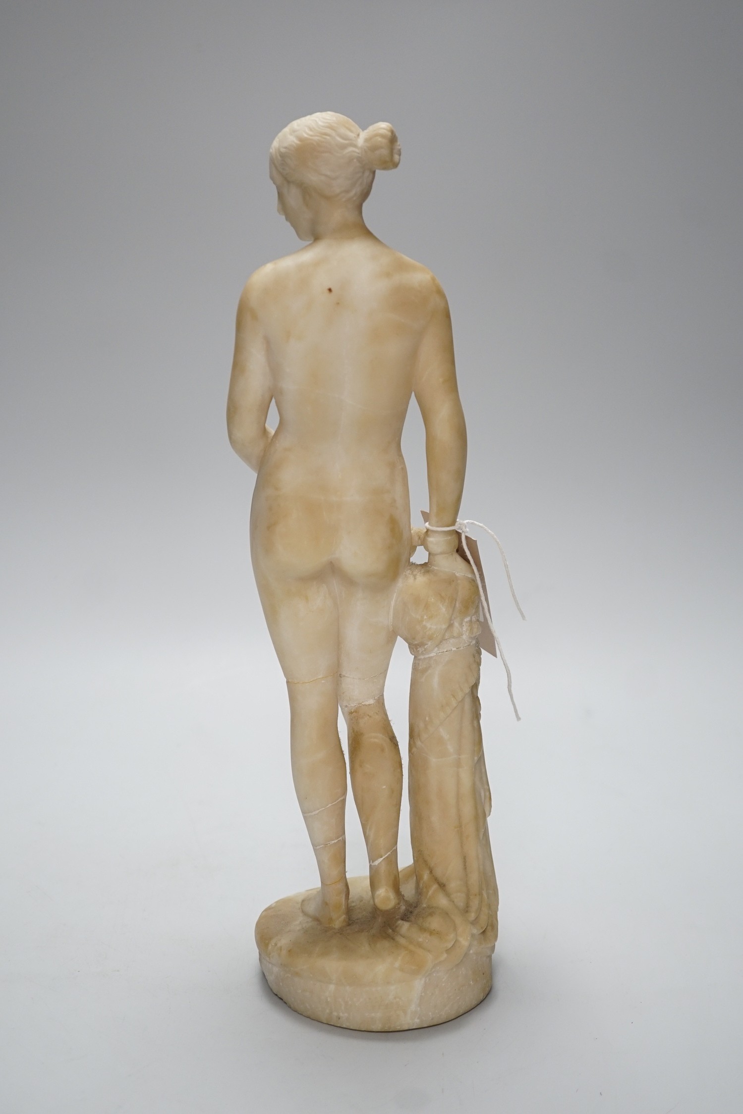 A carved alabaster female classical figure, the Greek slave Hiram Powers, 36cms high - Image 4 of 7