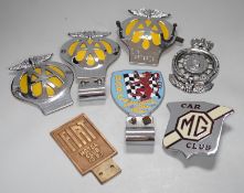 Seven car badges: Fiat motor club, British automobile racing club, MG club, the automobile club