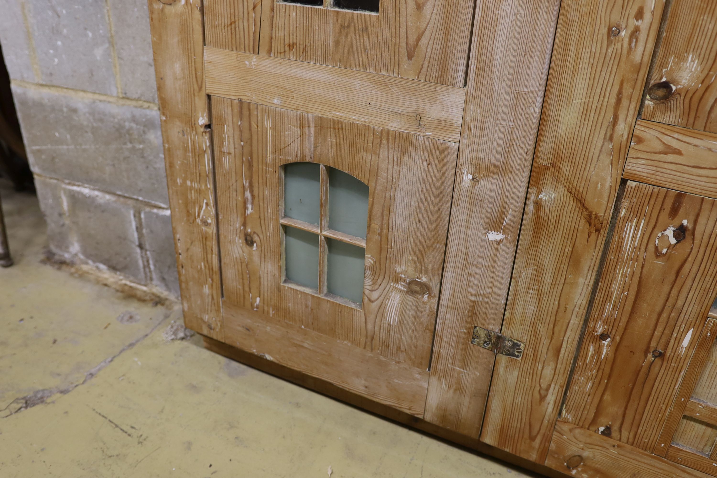 A 19th century stripped pine hall cupboard modelled as a dolls house the two door nine window facade - Image 4 of 20