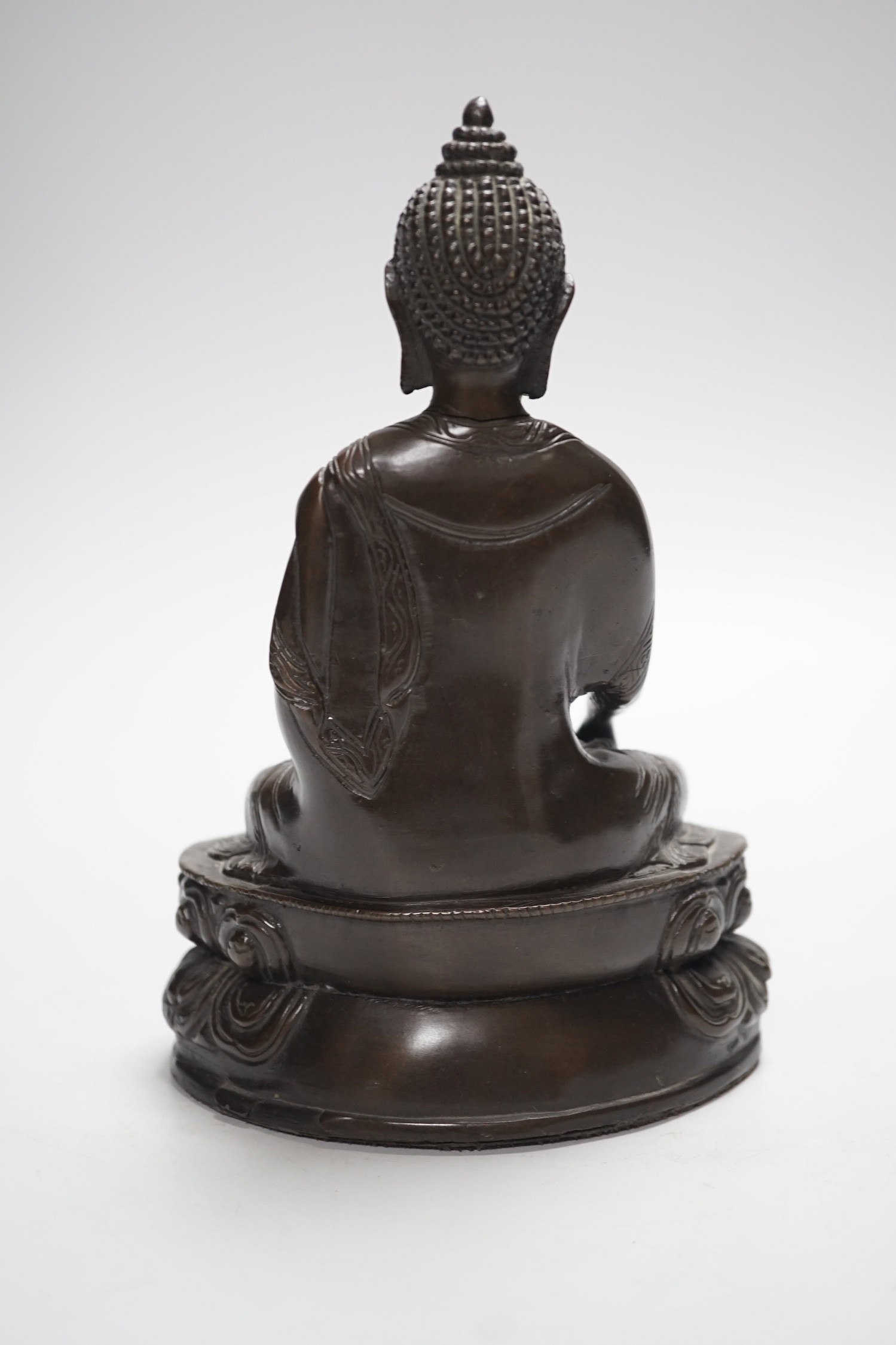 A Chinese bronze Buddha, on lotus base, 20cms high - Image 4 of 5