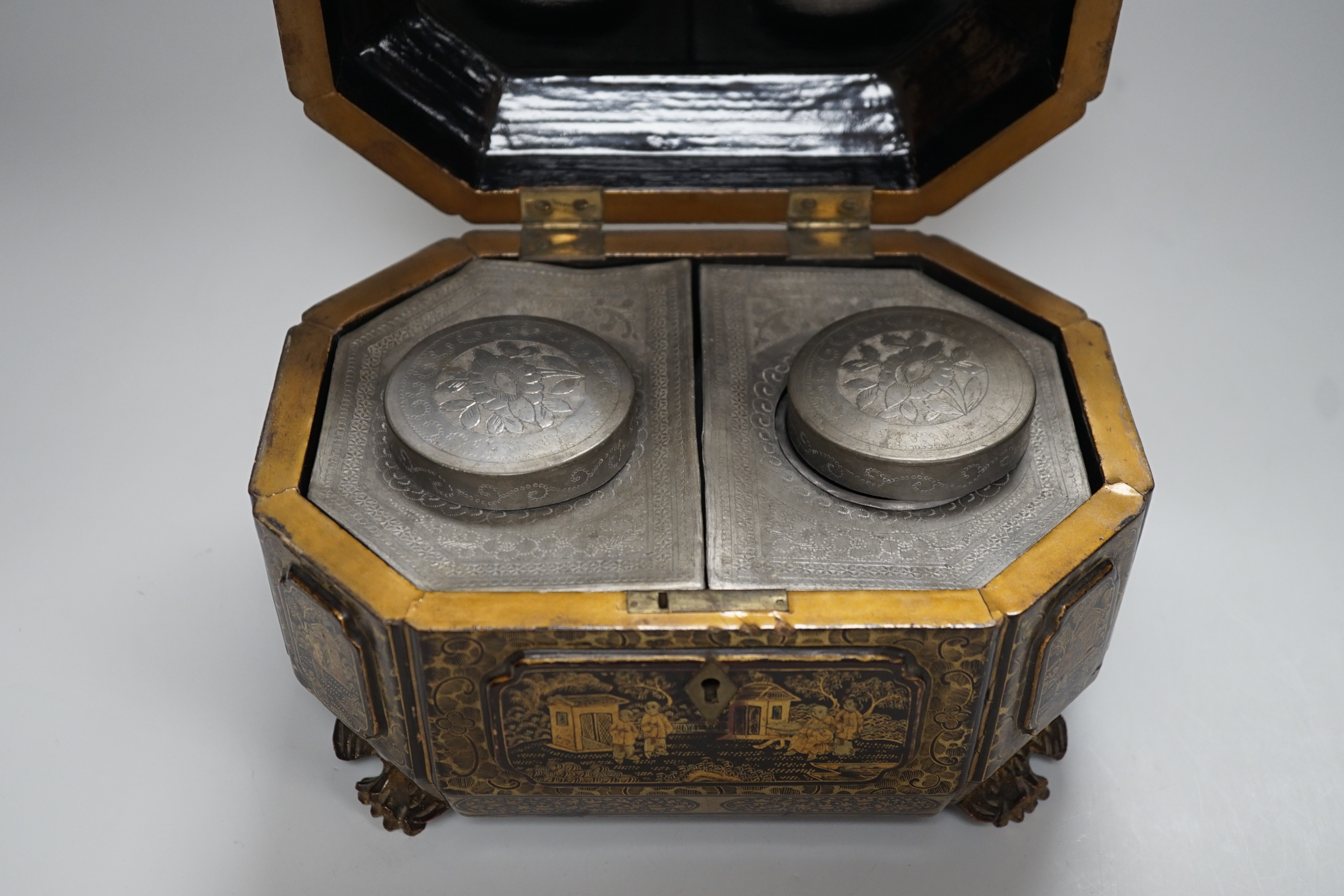 A 19th century Chinese chinoiserie lacquered sarcophagus form tea caddy, pewter lined interior - Image 6 of 6