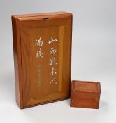 An early 20th century Chinese bone and bamboo mah jong set in two hardwood slide top boxes, largest