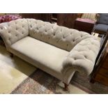A Victorian Chesterfield settee upholstered in buttoned pale green fabric, length 190cm, width 90cm,
