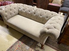 A Victorian Chesterfield settee upholstered in buttoned pale green fabric, length 190cm, width 90cm,