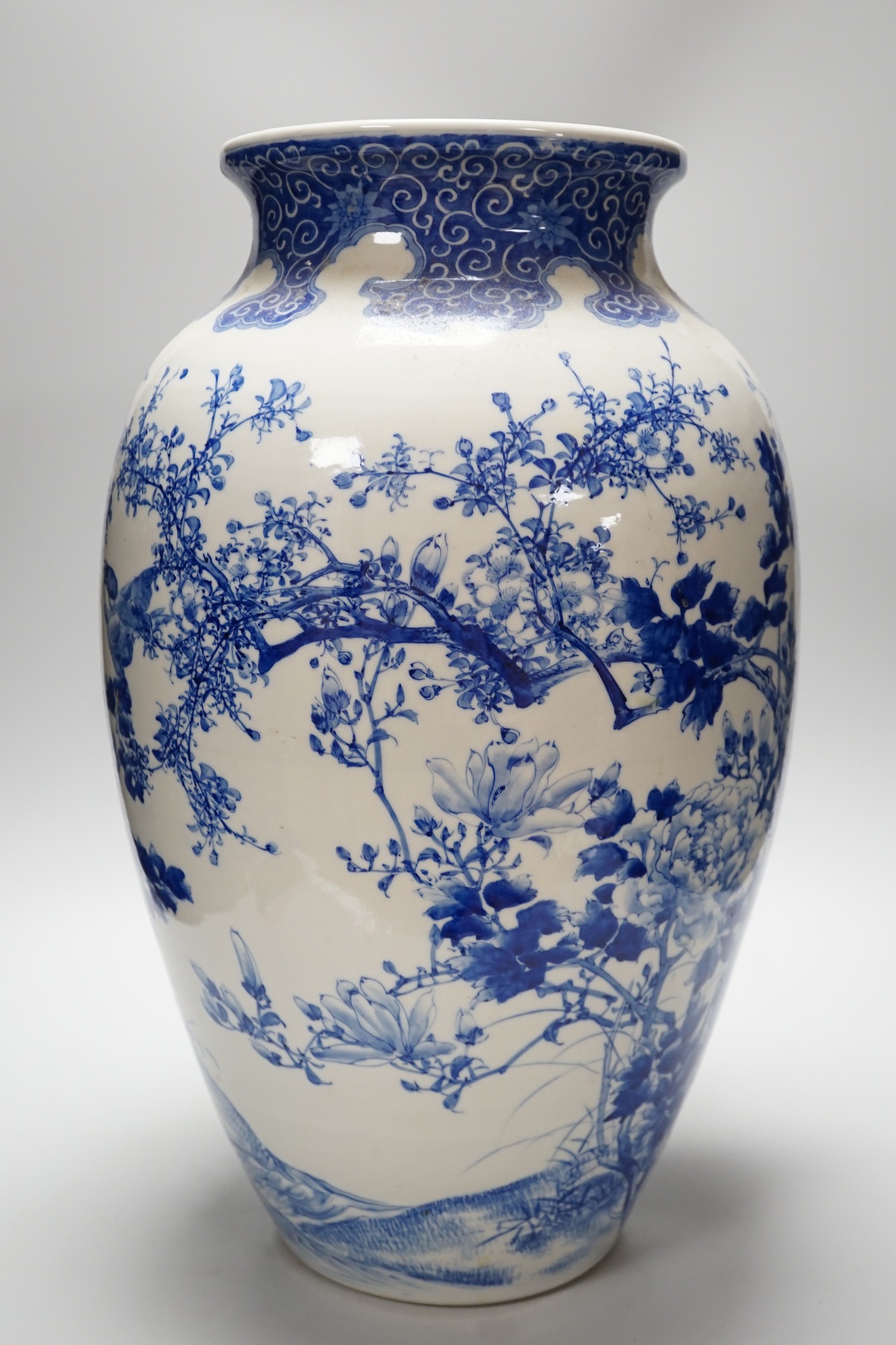 A large Japanese blue and white vase decorated with foliage and birds, 49cms high - Image 2 of 5