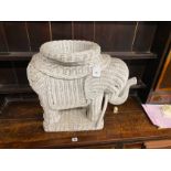 A painted wicker elephant jardiniere, height 50cm