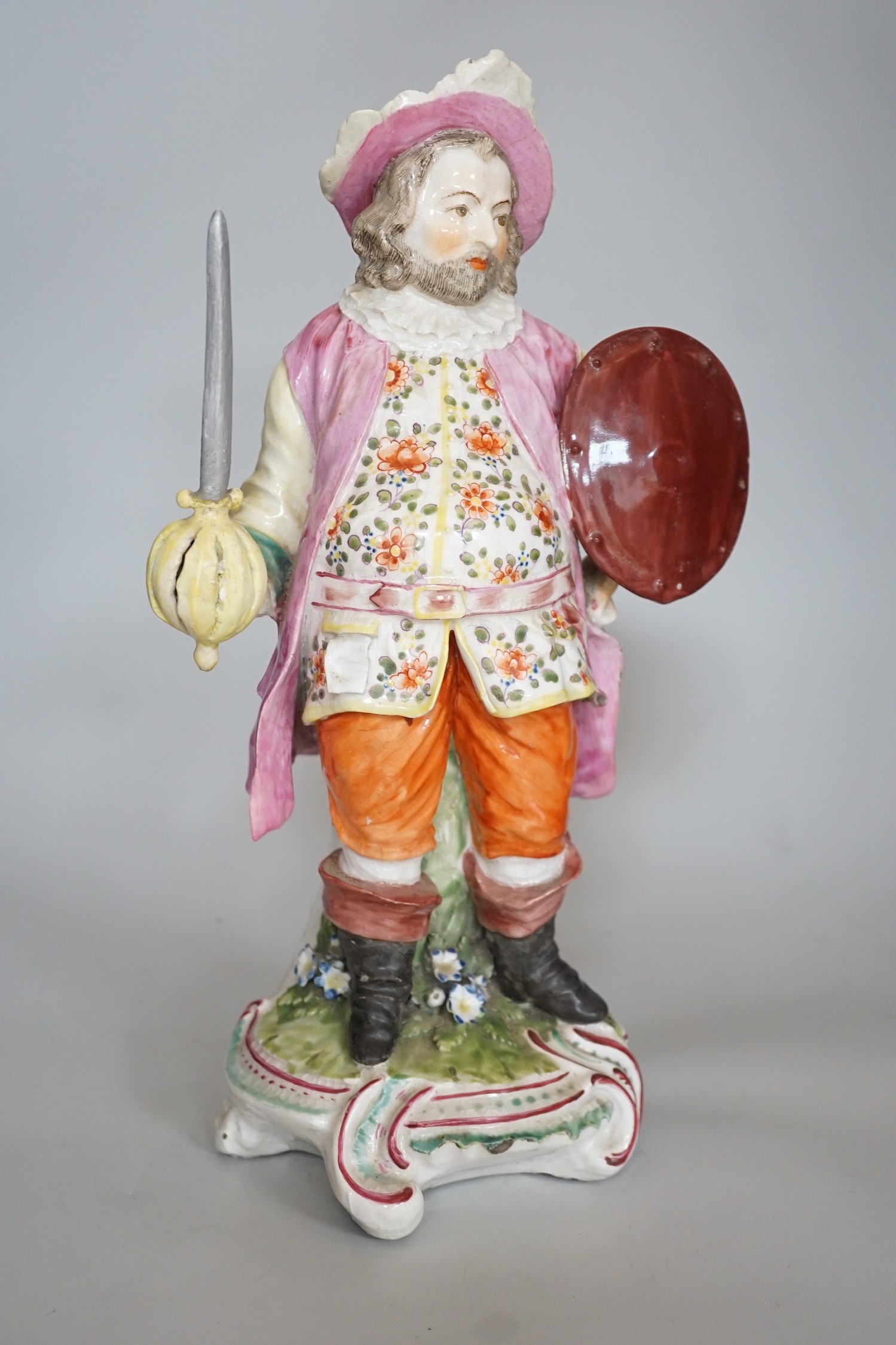 A large Derby figure of Falstaff standing, holding a sword and shield, patch marks, original brass - Image 5 of 6