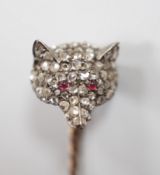A late Victorian yellow and white metal, cabochon ruby? and rose cut diamond set fox head stick pin,