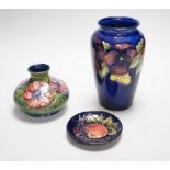 Two Moorcroft vases and a dish, tallest 20cm