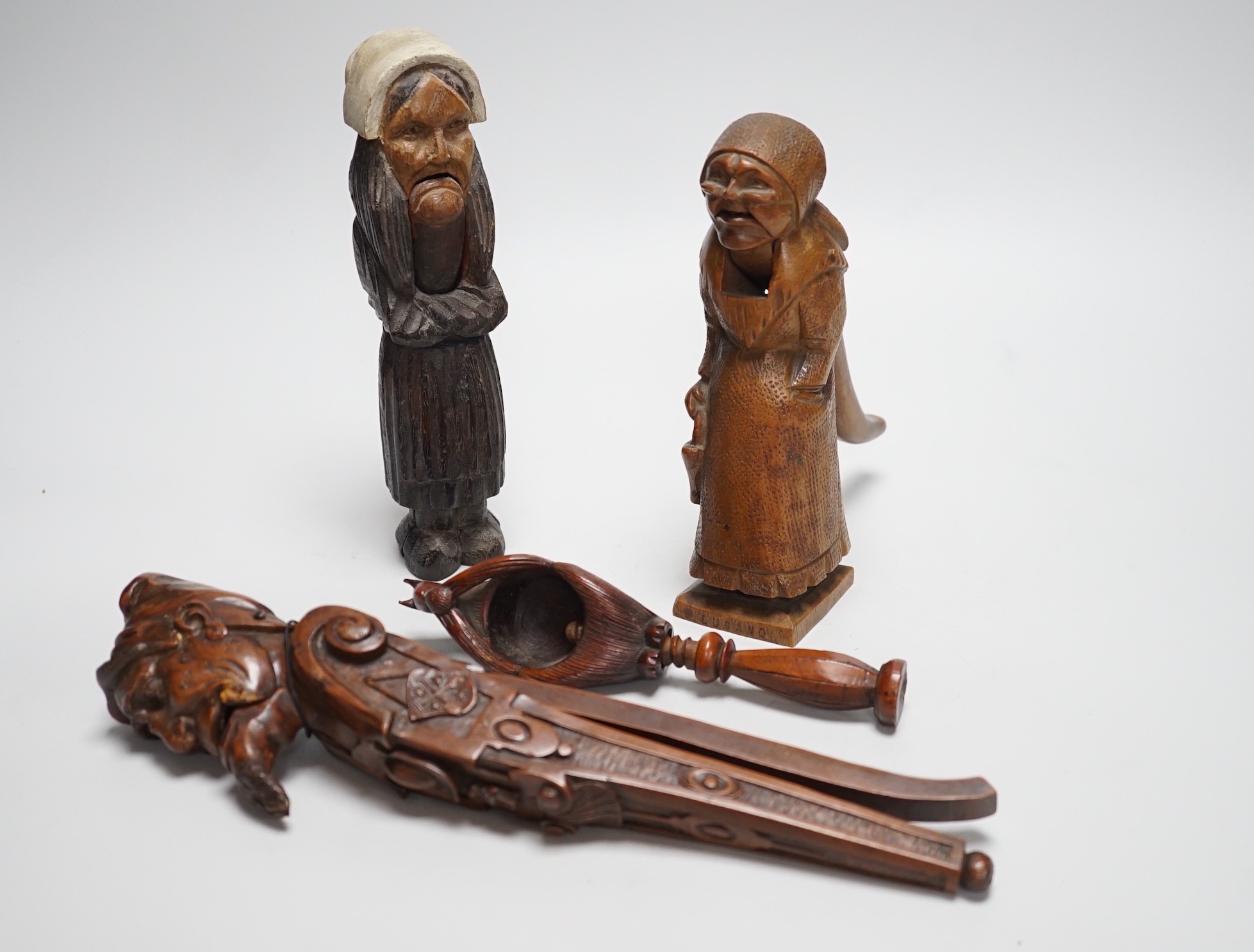 Four late 19th /early 20th century carved wood nutcrackers