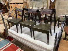 A set of six Regency brass inlaid mahogany dining chairs with green leather seats
