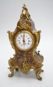 An early 20th century French gilt metal mounted painted mantel timepiece, 25cm