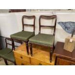 A set of eight early Victorian mahogany dining chairs on turned fluted legs