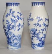 A pair of Japanese blue and white vases, 37cms high
