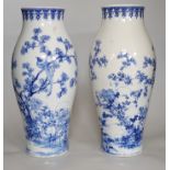 A pair of Japanese blue and white vases, 37cms high