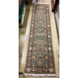 A North West Persian style green ground runner, 270 x 70cm