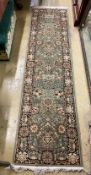 A North West Persian style green ground runner, 270 x 70cm
