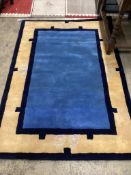 A contemporary Chinese style blue ground rug, 180 x 124cm