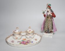 A 19th century German Inkstand with two pots and covers painted with flowers, 24cm wide, and a