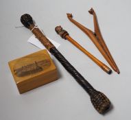 A pair of novelty treen glove-stretchers, 19cm, a similar pipe, a mauchline box and a 19th century