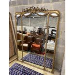 A Victorian giltwood and composition overmantel wall mirror with swagged ribbonfold surmount,