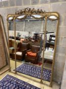 A Victorian giltwood and composition overmantel wall mirror with swagged ribbonfold surmount,