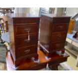 A pair of Victorian and later mahogany three drawer bedside chests (altered), width 39cm, depth