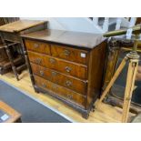 A 19th century crossbanded mahogany chest of two short and three long drawers with brass fitted loop