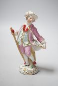 A Meissen figure of a young man with walking stick and his tail full of flowers, late 18th