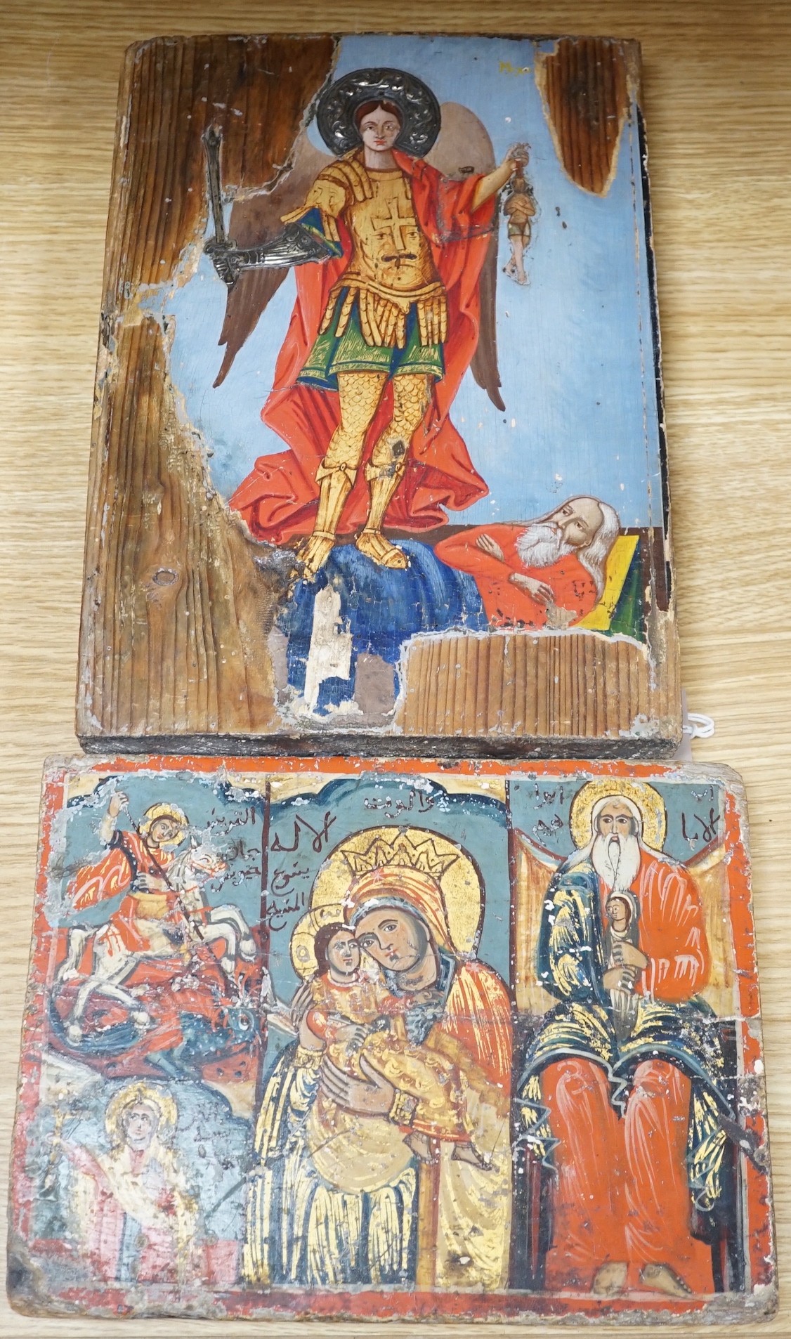 Two polychrome icons, largest 30cms high