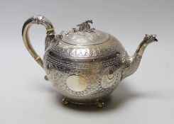 CITES- A Victorian embossed silver globular teapot, by William & John Barnard, London, 1893, with
